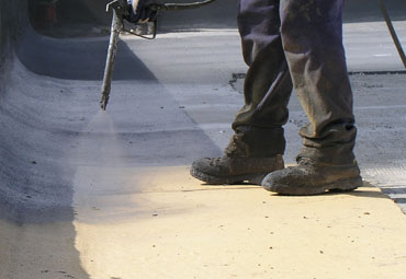 Coating systems over Bakersville spray foam roof systems