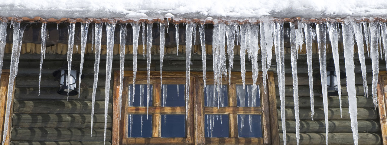 Spray foam prevents ice dams by providing proper insulation in Bakersville attic spaces
